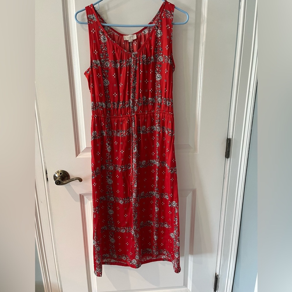 Beautiful never worn with tags midi style dress. Red and black, medium